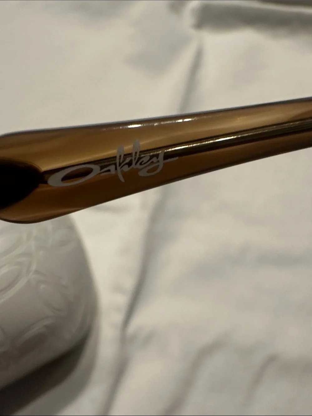 Oakley Amber Lens Translucent Brown Frame Sunglasses with White Case